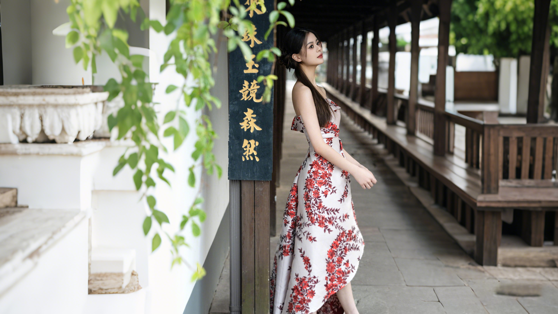 lotus jewelry meaning, elegant woman wearing symbolic pendant