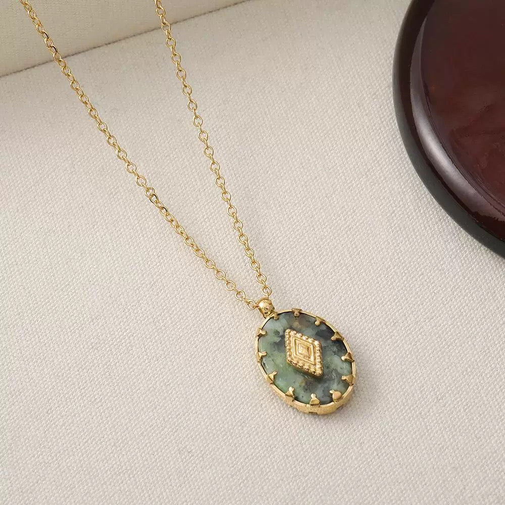 turquoise gemstone pendant necklace close up