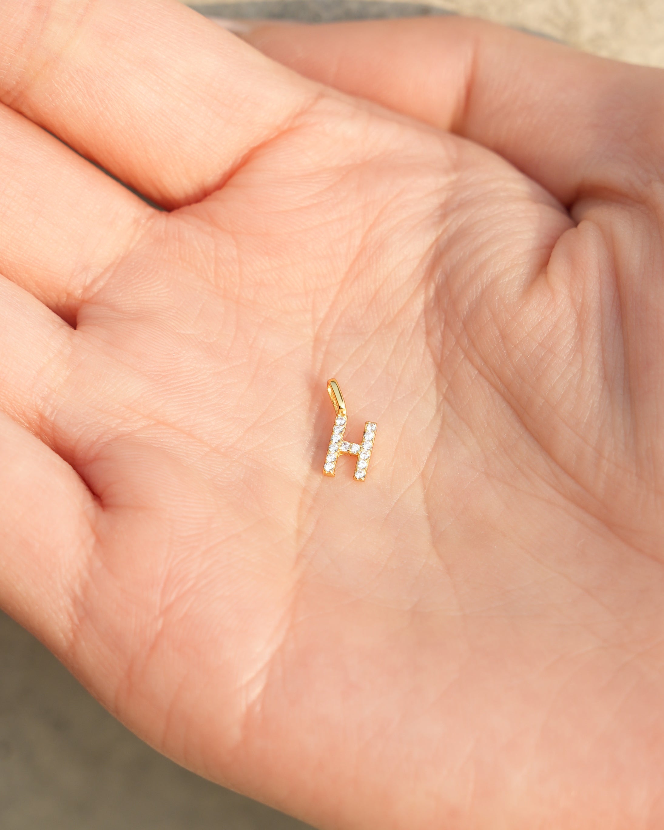 Zircon Initial H Charm