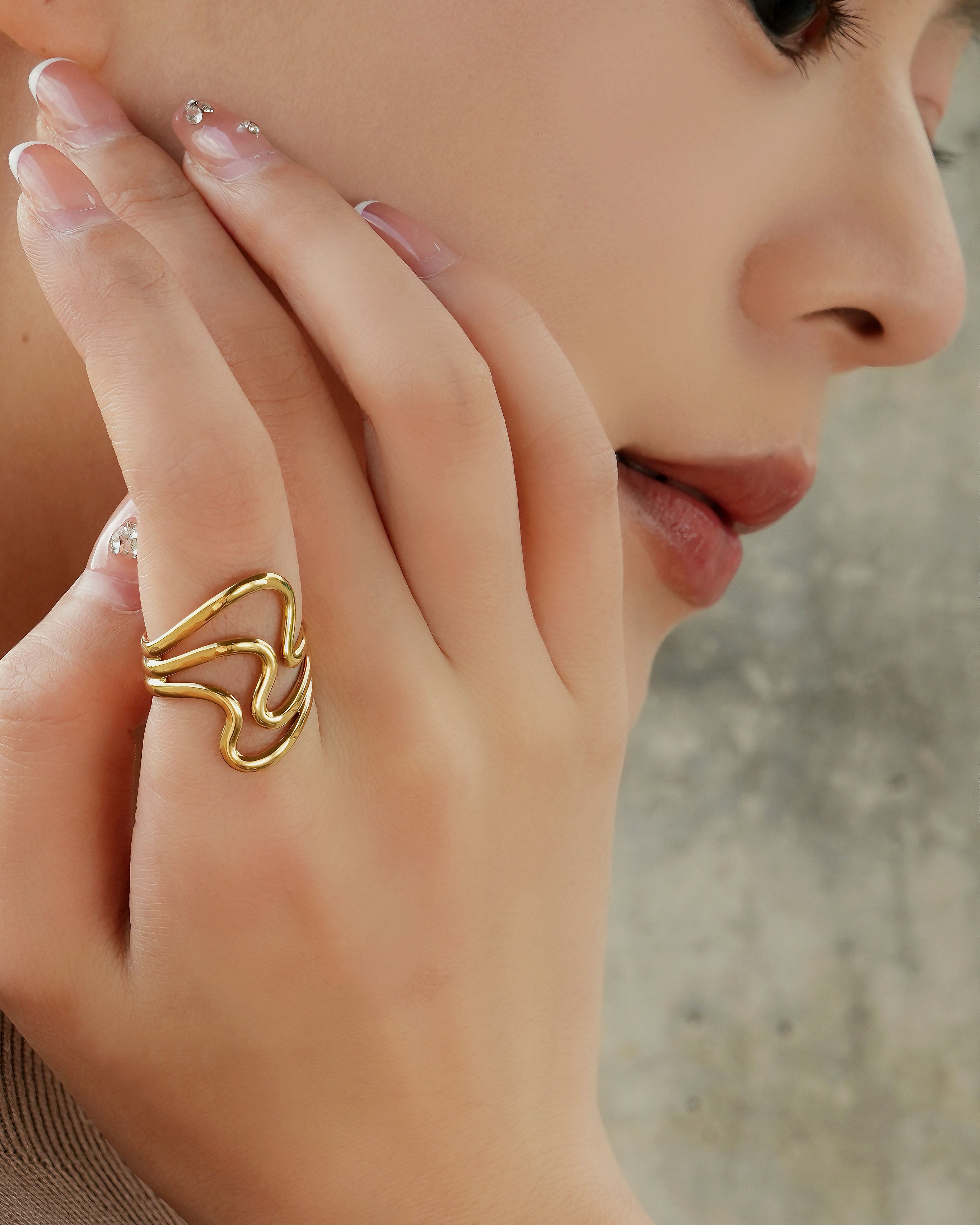 The Tidal Flow Modern Wave Adjustable Gold Ring