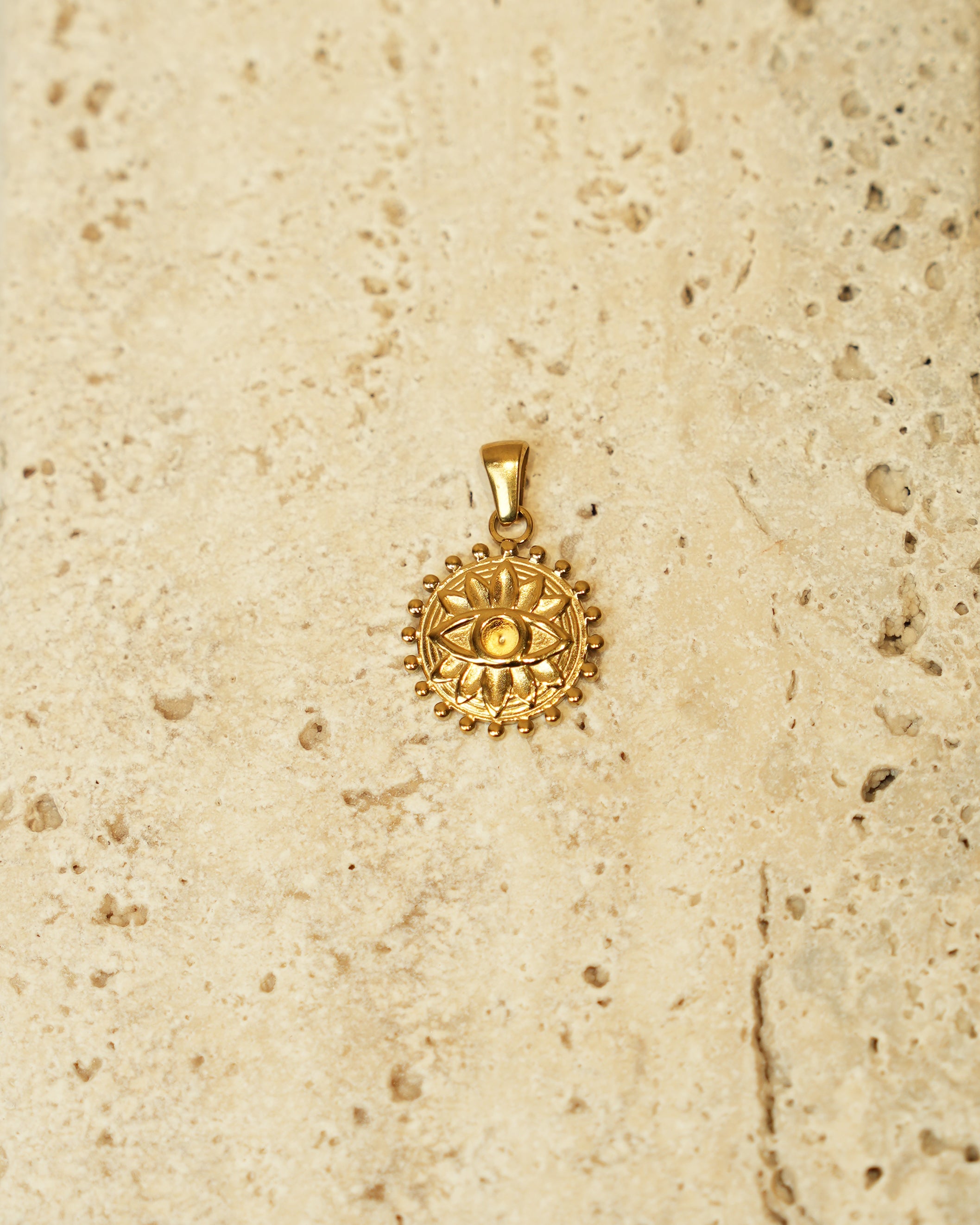 Ancient Evil Eye Solar Pendant