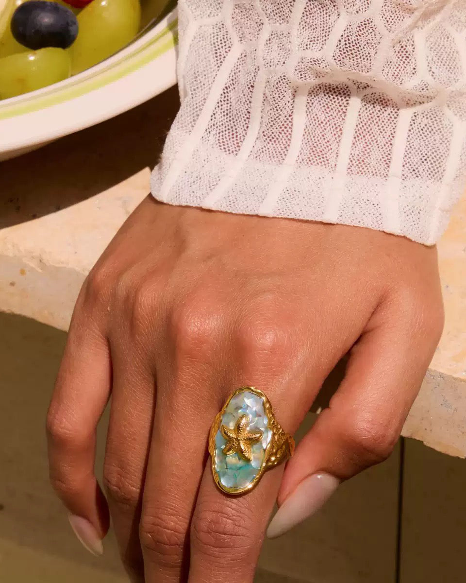 model wearing starfish ring ocean jewelry